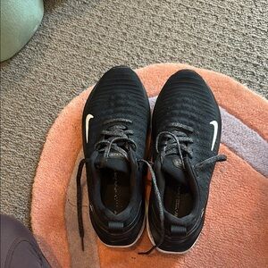 Nike Black Athletic Running Sneakers with White Swoosh